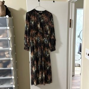 Beautiful Begonia dress new with tags never worn. Flattering A-line fit.